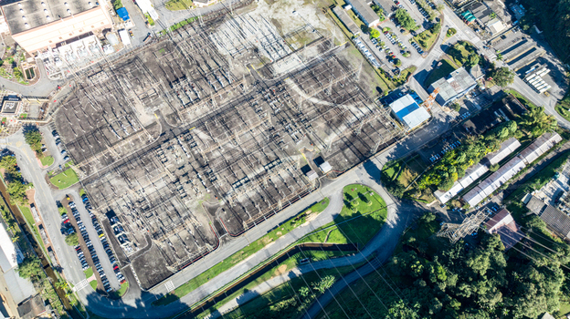 Aerial view of the electrical switchyard at the Nuclear Power Plant Angra 2 featuring power infrastructure transformers and surrounding greenery in Angra dos Reis Rio de Janeiro Brazil.