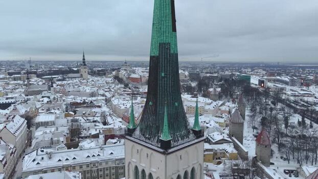 Aerial view of St. Olaf s Church in snowy Tallinn Estonia.