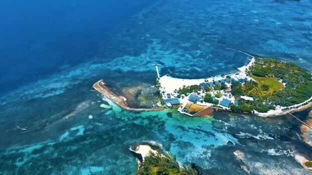 Aerial view of the tropical island of Guanaja and coral reefs Honduras. Aerial view of the tropical island of Guanaja and coral reefs Honduras.