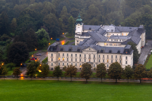 Aerial view of St. Peter s Abbey surrounded by lush trees and green lawns in the historic city of Salzburg Salzburg Austria. Aerial view of St. Peter s Abbey surrounded by lush trees and green lawns in the historic city of Salzburg Salzburg Austria.