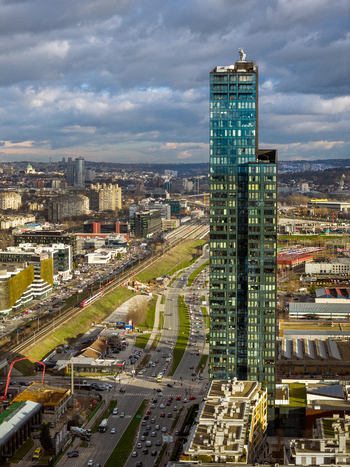 Aerial view of the modern Kula Belgrade skyscraper rising above the urban landscape with busy roads railway tracks and city buildings in Belgrade City of Belgrade Serbia. Aerial view of the modern Kula Belgrade skyscraper rising above the urban landscape with busy roads railway tracks and city buildings in Belgrade City of Belgrade Serbia.
