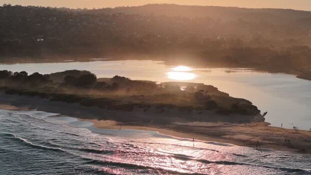 Aerial view of Dee Why Lagoon at sunset in Australia.