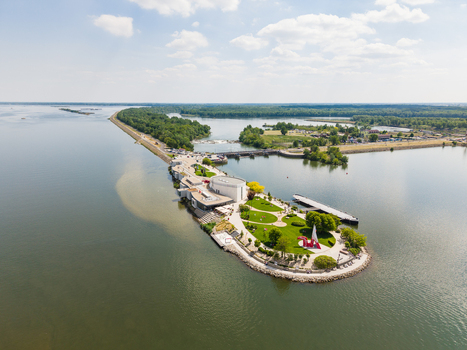 Aerial view of the Danubiana Meulensteen Art Museum on a peninsula in the Danube river with modern architecture and green parkland Bratislava Bratislavsky kraj Slovakia. Aerial view of the Danubiana Meulensteen Art Museum on a peninsula in the Danube river with modern architecture and green parkland Bratislava Bratislavsky kraj Slovakia.