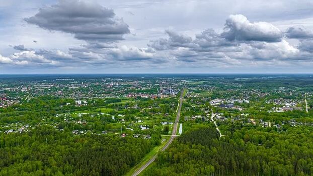 Aerial view of railway tracks through green forests Latvia. Aerial view of railway tracks through green forests Latvia.