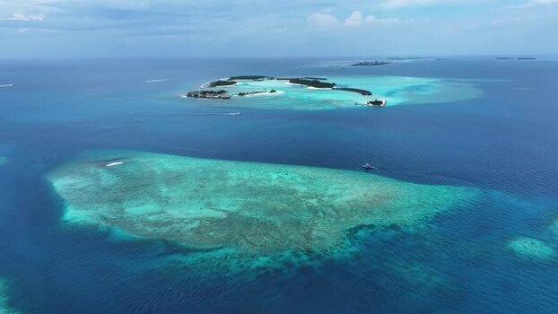 Aerial view of tropical islands and coral reefs Maldives. Aerial view of tropical islands and coral reefs Maldives.