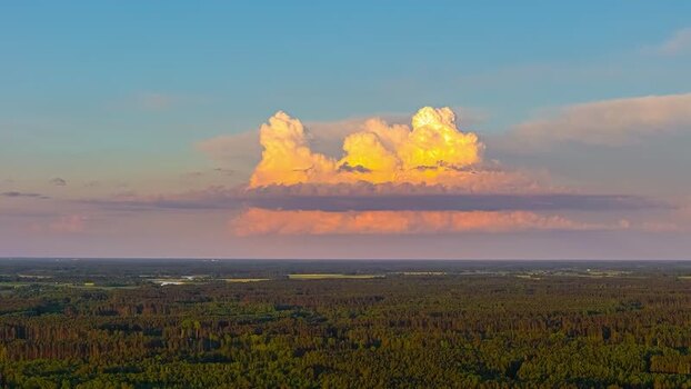 Aerial view of golden clouds over the Latvian forest Latvia. Aerial view of golden clouds over the Latvian forest Latvia.