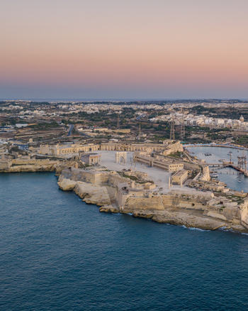 Aerial view of Fort Manoel surrounded by historic fortifications and the Mediterranean Sea in Valletta Port Region Malta. Aerial view of Fort Manoel surrounded by historic fortifications and the Mediterranean Sea in Valletta Port Region Malta.