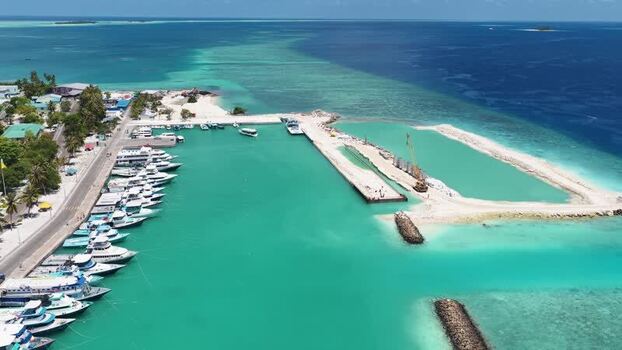 Aerial view of the harbor and boats in Kudahuvadhoo Maldives.
