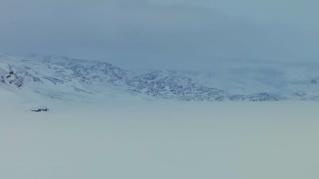 Aerial view of snowy mountains near Pyramiden Svalbard and Jan Mayen.