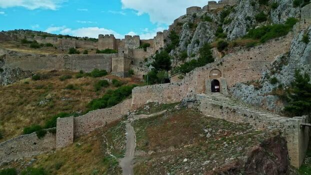 Aerial view of Acrocorinth fortress on a rocky hill Greece.
