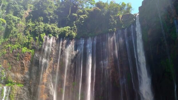 Aerial view of Tumpak Sewu Waterfall cascades Indonesia.