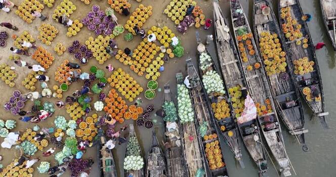 Aerial view of a vibrant floating market with boats Bangladesh.
