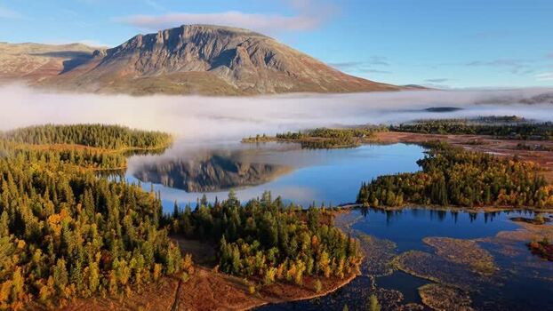 Aerial view of Lake Helsingvatnet and Mount Skogshorn Norway. Aerial view of Lake Helsingvatnet and Mount Skogshorn Norway.