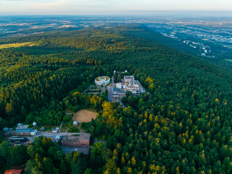 Aerial view of the Max Planck Institute for Astronomy nestled within the dense forest of the Konigstuhl hill in Heidelberg Baden Wurttemberg Germany.