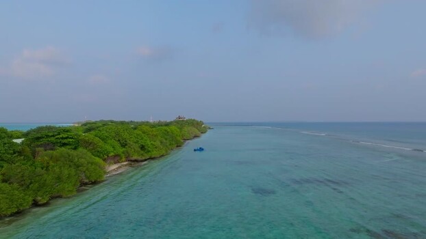 Aerial view of island with building Maldives.