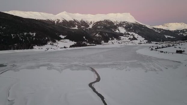 Aerial view of frozen Lake Reschen in Graun im Vinschgau Italy. Aerial view of frozen Lake Reschen in Graun im Vinschgau Italy.