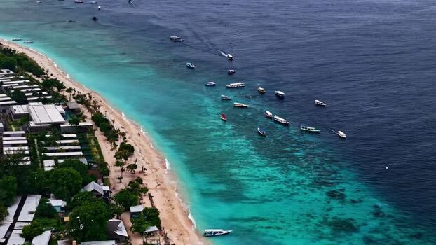 Aerial view of boats near the coast of Bali Indonesia.