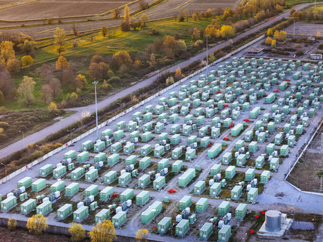Trino Italy 30 March 2026 Aerial view of a vast solar farm bathed in the warm glow of the setting sun its panels reflecting light amidst the surrounding fields. Trino Italy 30 March 2026 Aerial view of a vast solar farm bathed in the warm glow of the setting sun its panels reflecting light amidst the surrounding fields.