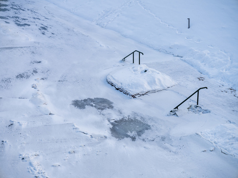 View of snow covered stairs and metal railings in a winter landscape in Vilnius Vilnius County Lithuania. View of snow covered stairs and metal railings in a winter landscape in Vilnius Vilnius County Lithuania.