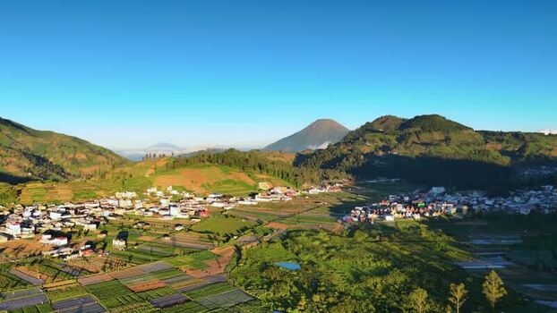 Aerial view of Dieng plateau and mountains in Kejajar Indonesia. Aerial view of Dieng plateau and mountains in Kejajar Indonesia.