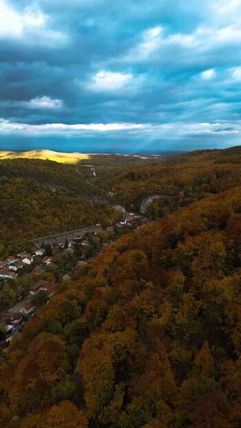 Aerial view of autumn forest and town in Miskolc Hungary. Aerial view of autumn forest and town in Miskolc Hungary.