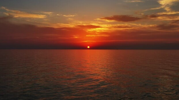 Aerial view of sunset over the calm sea in Montenegro. Aerial view of sunset over the calm sea in Montenegro.