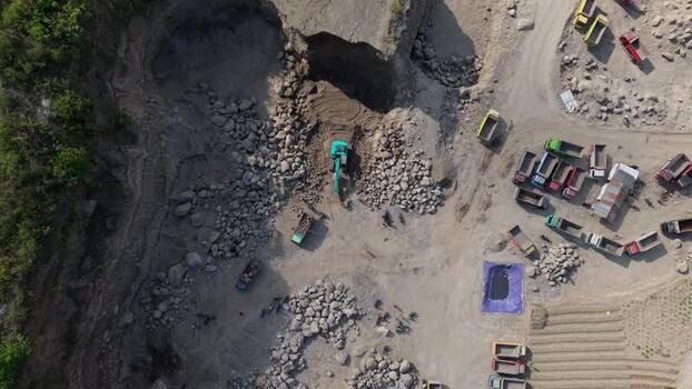Aerial view of a quarry with trucks Indonesia. Aerial view of a quarry with trucks Indonesia.