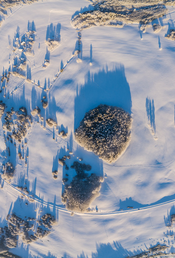Aerial view of snow covered fields and forests in Latvia. Aerial view of snow covered fields and forests in Latvia.