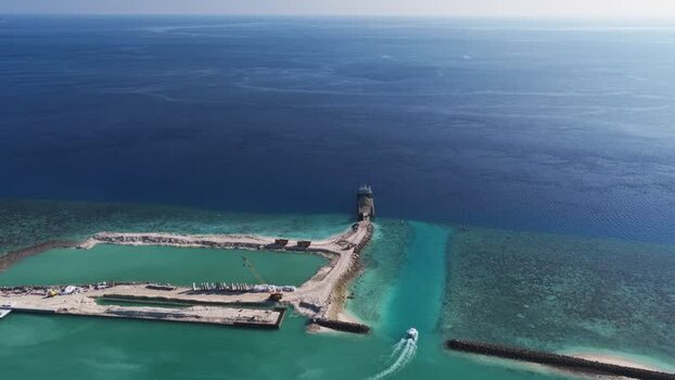 Aerial view of a harbor construction site and boat Maldives. Aerial view of a harbor construction site and boat Maldives.