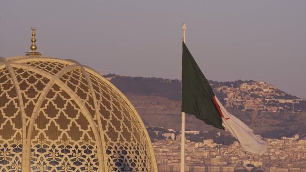 Aerial view of Ketchaoua Mosque and Algerian flag Algeria.