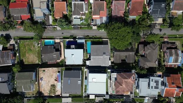 Aerial view of residential houses and pools in Kuala Lumpur Malaysia. Aerial view of residential houses and pools in Kuala Lumpur Malaysia.
