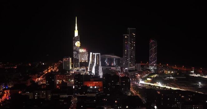 Aerial view of Batumi skyline at night with illuminated towers Georgia.