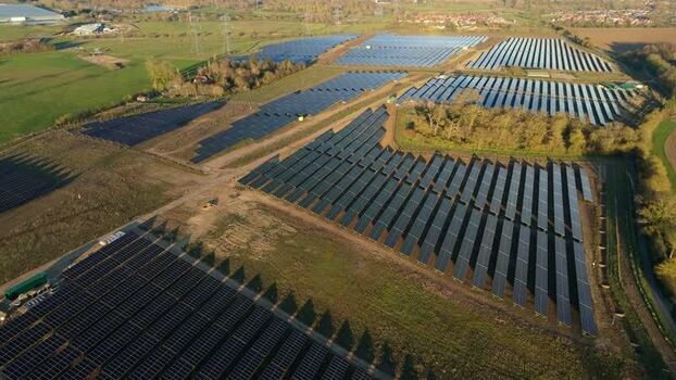 Aerial view of Tye Lane Solar Farm United Kingdom. Aerial view of Tye Lane Solar Farm United Kingdom.