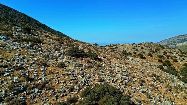 Aerial view of rocky mountainous landscape in Crete Greece.