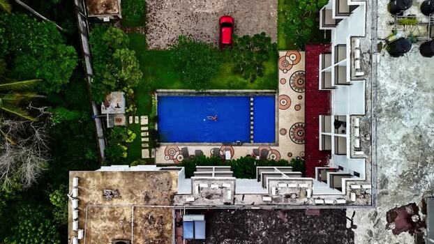 Aerial view of resort swimming pool in Indonesia.