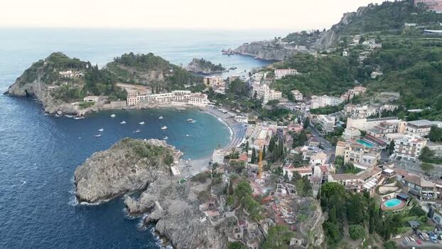 Aerial view of Isola Bella and Mazzaro Bay Italy.