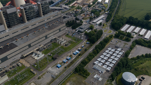 Aerial view of Battery Energy Storage Park Beside Traditional Power Plant Aerial view of Battery Energy Storage Park Beside Traditional Power Plant