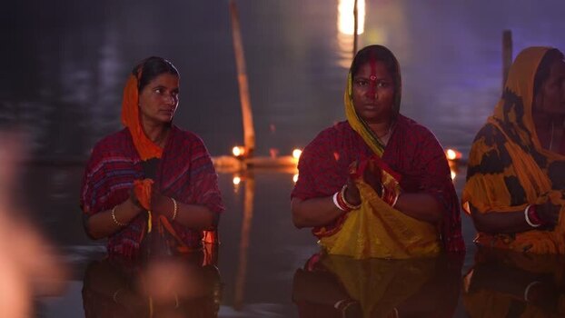 View of Hindu women performing Chhath Puja rituals Bangladesh. View of Hindu women performing Chhath Puja rituals Bangladesh.