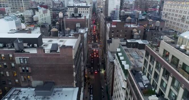 Aerial view of traffic and rooftop water tanks in Chelsea United States.