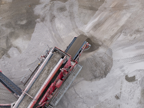Aerial view of a conveyor belt system processing gravel and debris at a demolition site in Krakow Lesser Poland Voivode Poland.