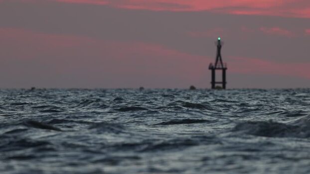 View of a navigational buoy in the sea France.
