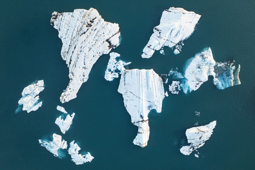 Aerial view of icebergs floating in the deep blue glacial waters of Jokulsarlon lagoon Sveitarfelagid Hornaf Iceland. Aerial view of icebergs floating in the deep blue glacial waters of Jokulsarlon lagoon Sveitarfelagid Hornaf Iceland.