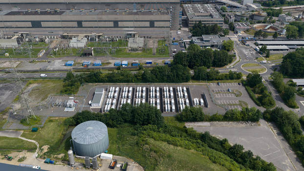 Aerial view of Battery Energy Storage Park Beside Traditional Power Plant Aerial view of Battery Energy Storage Park Beside Traditional Power Plant