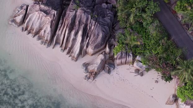 Aerial view of Praslin beach with granite rocks Seychelles.