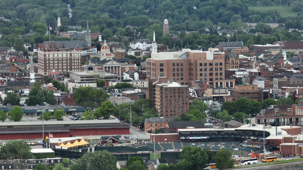 Aerial view of the cityscape of York featuring the baseball stadium historic buildings church steeples and dense urban architecture in York Pennsylvania United States. Aerial view of the cityscape of York featuring the baseball stadium historic buildings church steeples and dense urban architecture in York Pennsylvania United States.