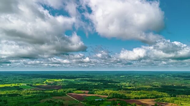 Aerial view of the lush forests and fields in Latvia. Aerial view of the lush forests and fields in Latvia.