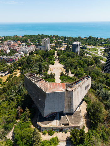 Aerial view of the Monument of the Bulgarian Soviet Friendship surrounded by lush green parkland with the Black Sea in the background in Varna Varna Bulgaria.