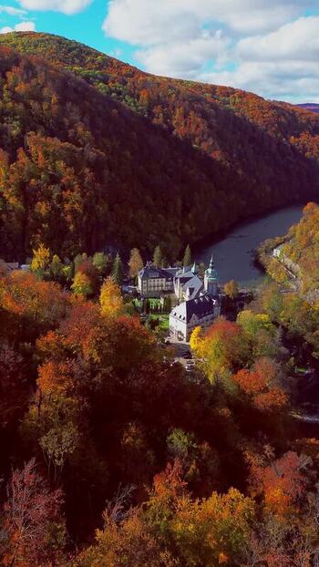 Aerial view of Palace Hotel in autumn forest Hungary. Aerial view of Palace Hotel in autumn forest Hungary.