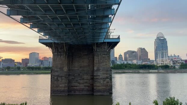 View of John A. Roebling Suspension Bridge at sunset United States.