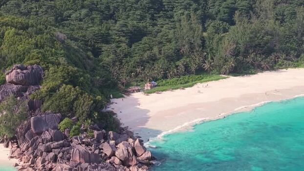Aerial view of Anse Reunion beach and granite boulders Seychelles.